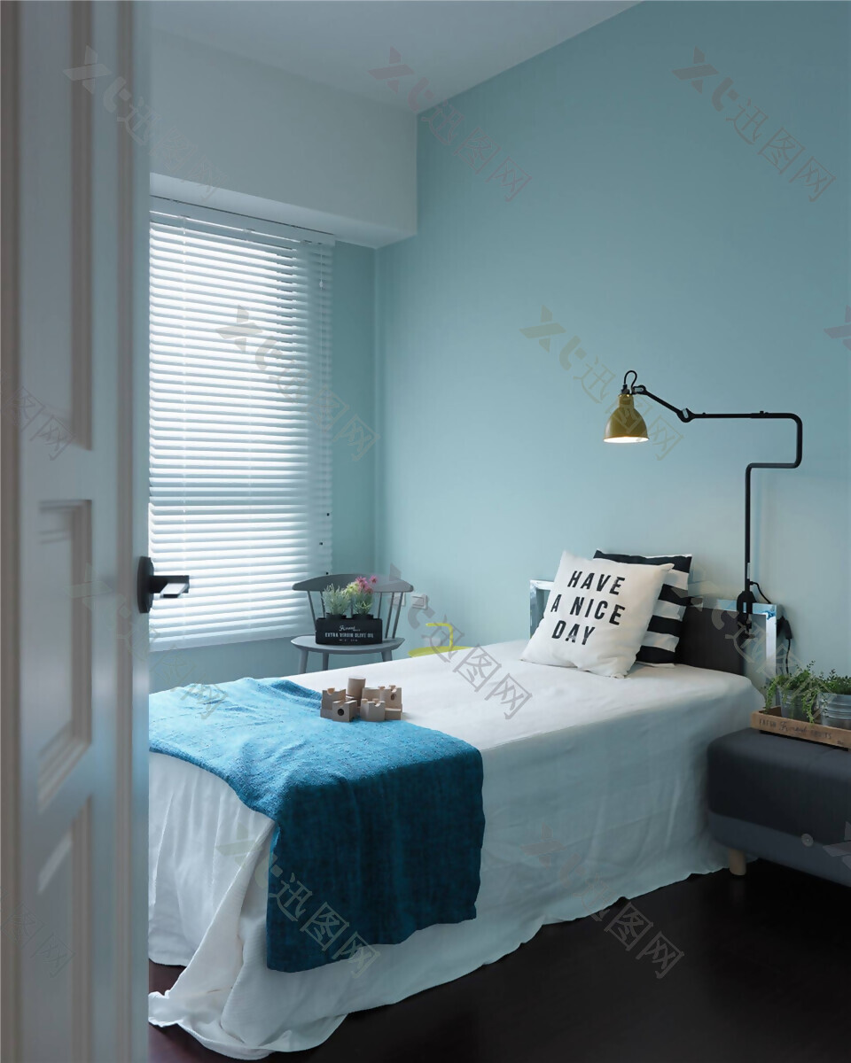 现代清新卧室浅蓝色背景墙室内装修效果图