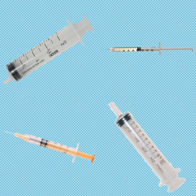 四个塑料注射器免抠png透明图层素材